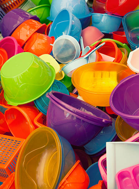 Colorful plastics multicolored washbowls and other plastic wares. plastic container stock pictures, royalty-free photos & images