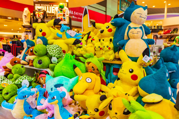 Colorful Pokemon Pikachu plush toys in Bangkok airport Thailand. stock photo