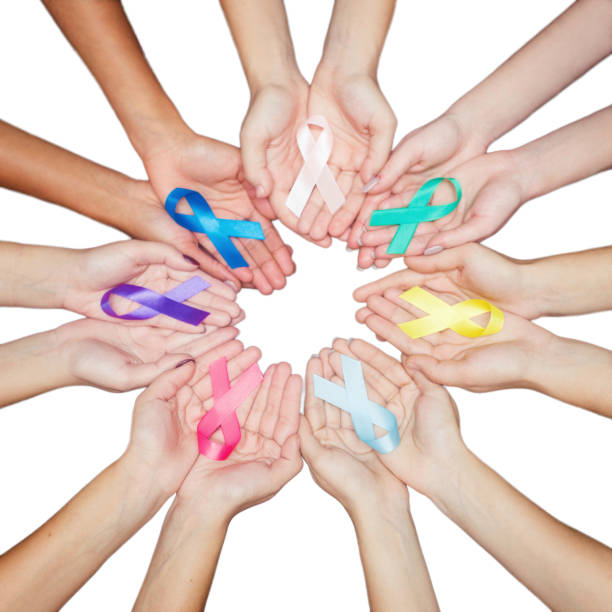 colorful ribbons, cancer awareness, world cancer day background. many ribbons on hands isolated on white - world cancer day imagens e fotografias de stock