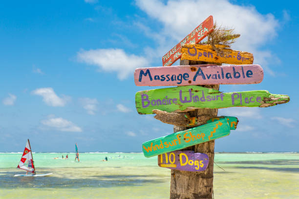 Colorful signpost at coast of Bonaire stock photo