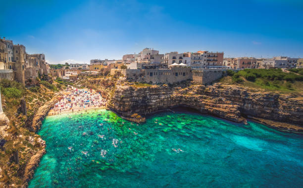 colorful south italy village in Puglia in the town of Polignano colorful south italy village in Puglia in the town of Polignano a Mare province of Bari . puglia stock pictures, royalty-free photos & images