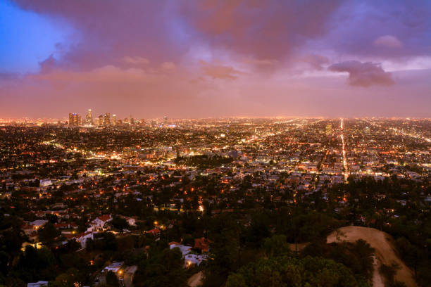 Colorful Sunset over Los Angeles Skyline seen from Griffith Observatory stock photo