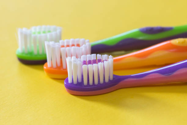 Colorful toothbrushes stock photo