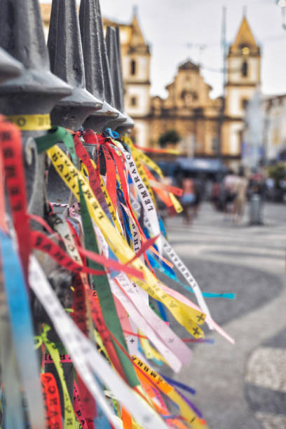 colorful traditional ribbons at fence in Salvador, Brazil stock photo