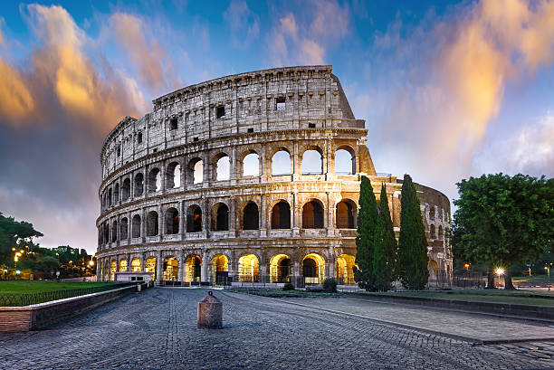 Colosseum in Rome at dusk, Italy stock photo