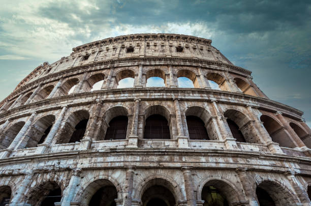 Colosseum in Rome (Roma), Italy. The most famous Italian sightseeing on blue sky stock photo