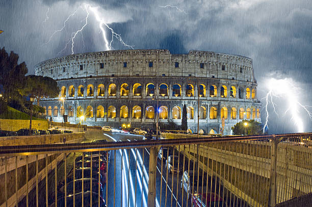 Colosseum in the night. Raining and lightning stock photo