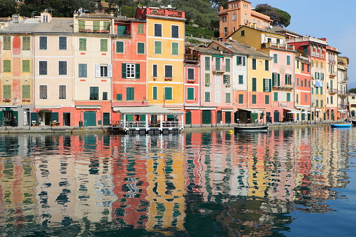 Italy, Portofino - February 28 2021
Coloured houses refleted on the water in Portofino village Liguria Italy