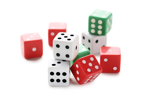 Colourful dice isolated on white background