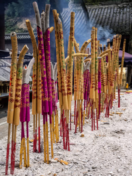 Colourful incense sticks burning at the Jiazhou Huayuan temple, Dafo, Leshan, Chengdu, China stock photo