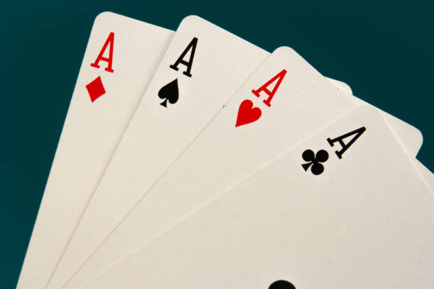 combination of four different play cards stock photo