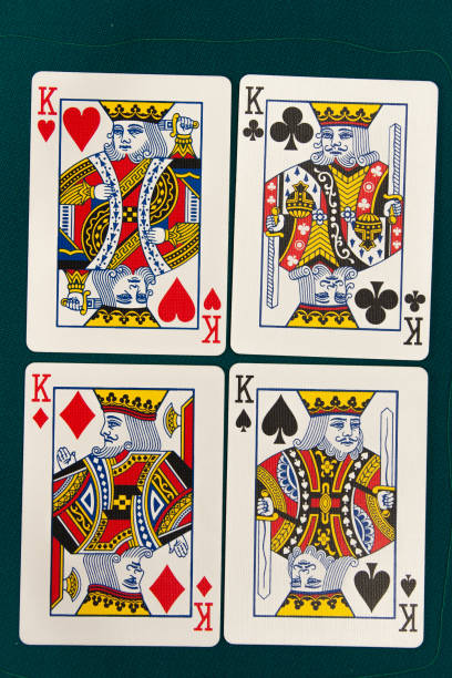 combination of four different play cards stock photo