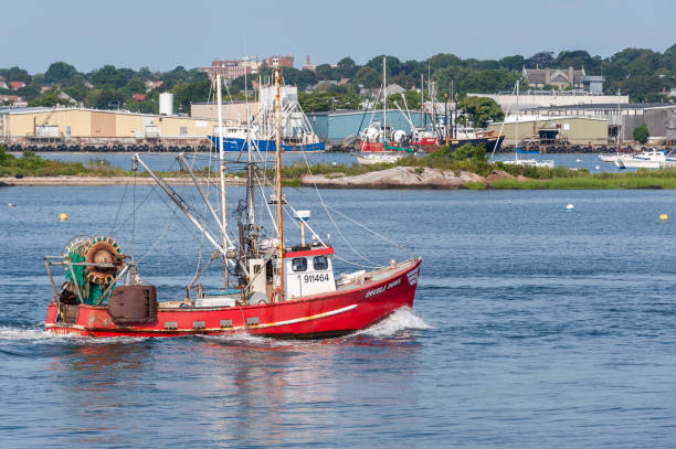 Commercial fishing vessel Double Down crossing New Bedford inner harbor stock photo