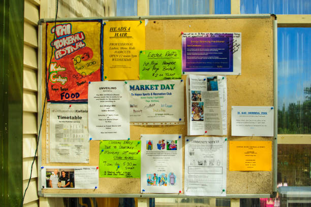 Community bulletin board with various messages in Te Kao stock photo