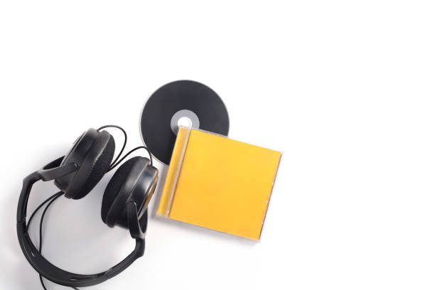 Compact Disc with headphones. stock photo