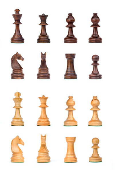 complete chess pieces set isolated complete black and white chess pieces set isolated chess piece stock pictures, royalty-free photos & images