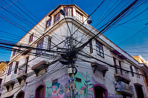 La Paz, Bolivia - August 17, 2019: Cityscape of La Paz with tangled electrical cables.