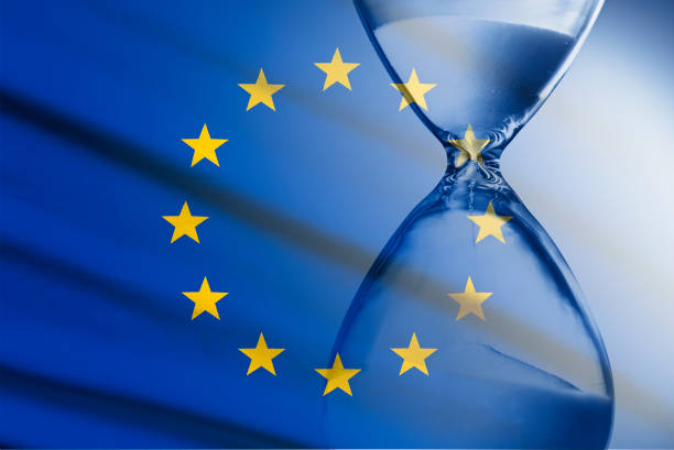 Composite image of the EU flag and hourglass stock photo