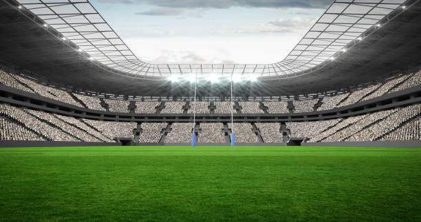 Composition of empty sports stadium with rugby field Composition of empty sports stadium with rugby field. sport, fitness and active lifestyle concept digitally generated image. Ireland Soccer stock pictures, royalty-free photos & images