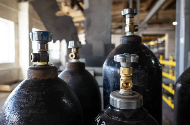 Compressed gas cylinders in the production room of an industrial plant stock photo
