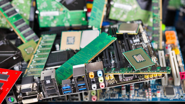 Computer and laptop cards. Mainboards, processors and memories. E-waste sorting and disposal stock photo