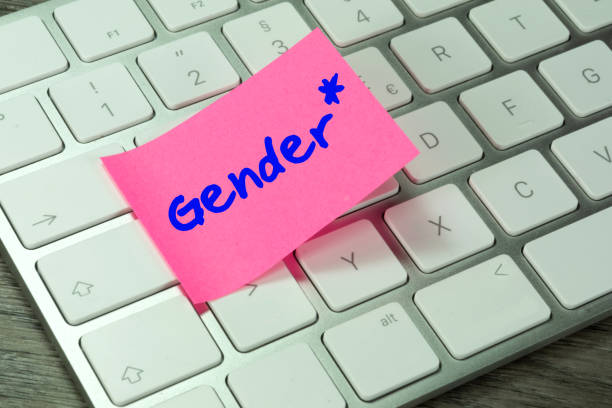 A Computer and Note Gender stock photo