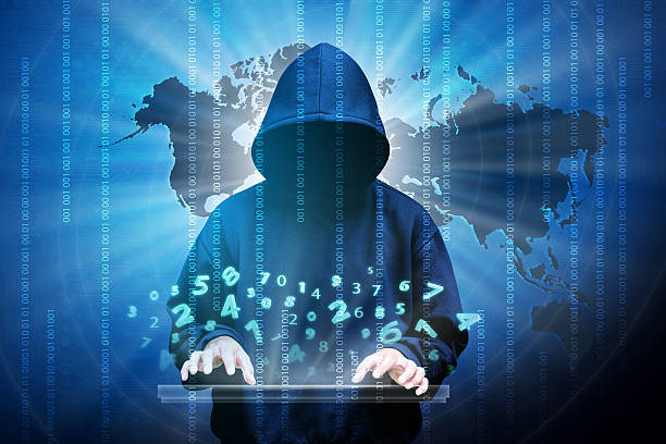 Computer hacker silhouette of hooded man Computer hacker silhouette of hooded man with binary data and network security terms threats stock pictures, royalty-free photos & images