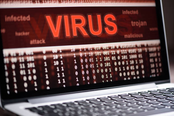 computer virus protection Computer virus protection concept. Alert of hacker attacks on the laptop screen computer virus stock pictures, royalty-free photos & images