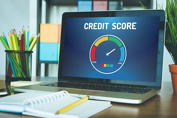Computer with credit score application on a screen stock photo
