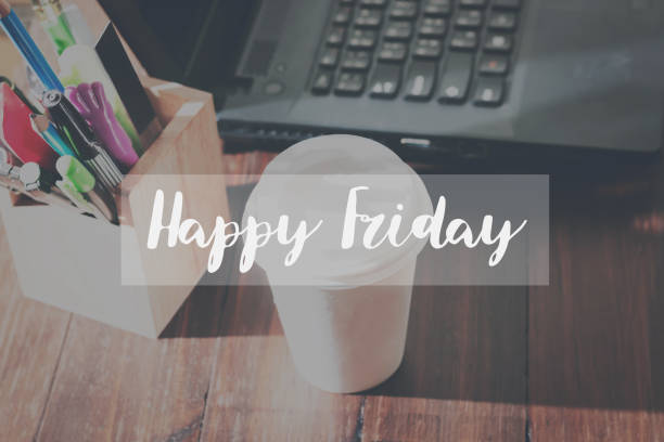 Concept Happy friday message on the device works the table background Concept Happy friday message on the device works the table background happy friday stock pictures, royalty-free photos & images