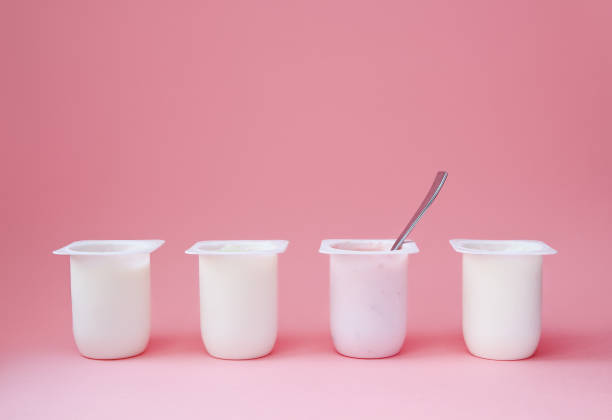 Concept of better choice of yougurt in minimal style. stock photo
