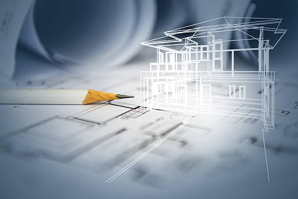 concept of dream house draw by designer with construction drawin stock photo