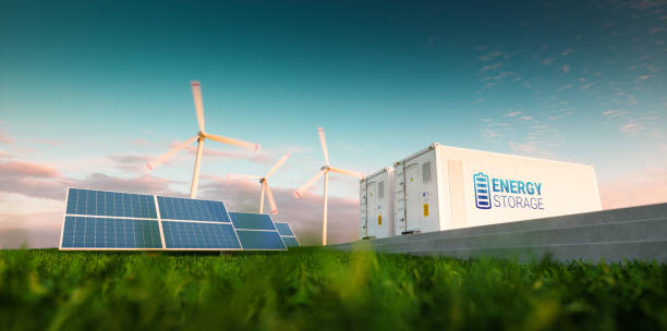 Concept of energy storage system. Renewable energy - photovoltaics, wind turbines and Li-ion battery container in morning fresh nature. 3d rendering. stock photo