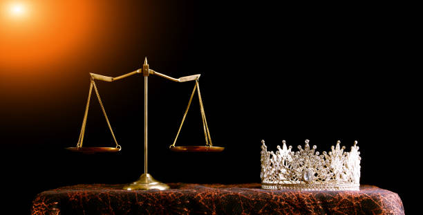 Concept of Judge Justice in Pageant Contest Business on money and crown Diamond Crown of Miss Beauty Queen Pageant Contest and Scale Justice Balance are on Black Background as ramp light leak. Concept of Fairness and unfair in Pageant Contest Business, copy space beauty pageant stock pictures, royalty-free photos & images