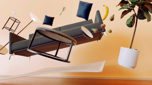 Concept of living room with furniture flying through the air Concept of sofa, table and other furniture items from a living room flying through the air with zero gravity. Maybe due to an earthquake or paranormal activity. levitation stock pictures, royalty-free photos & images