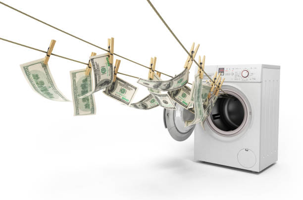 concept of money laundering dollar money bills concept of money laundering dollar money bills on roupe 3d ender on white money laundering stock pictures, royalty-free photos & images