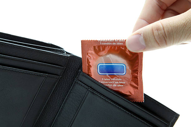 Image result for condom in a wallet