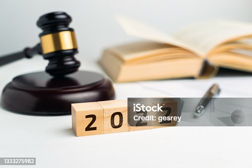 istock Concept of the court and law with a judge's gavel in 2022 year 1333275982