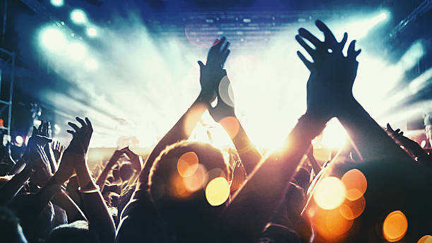 Concert crowd. Shoot Production Ref #70 - This submission was created with Shoot Production Tool feedback. staging light stock pictures, royalty-free photos & images