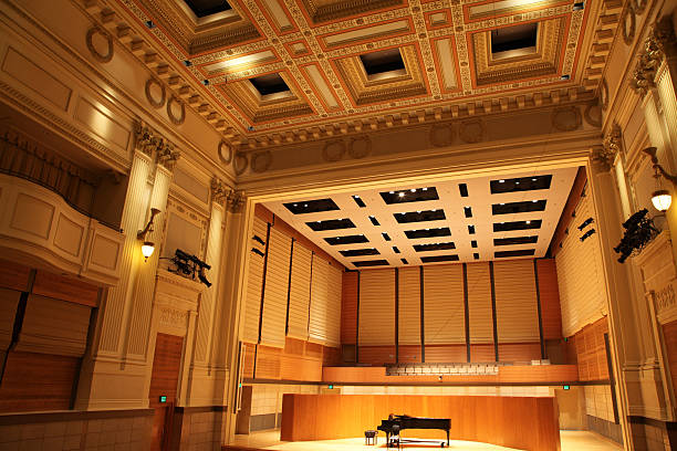 Concert Hall with Grand Piano on Stage stock photo