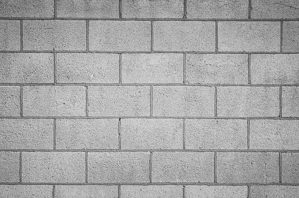 Concrete block wall seamless background and texture stock photo
