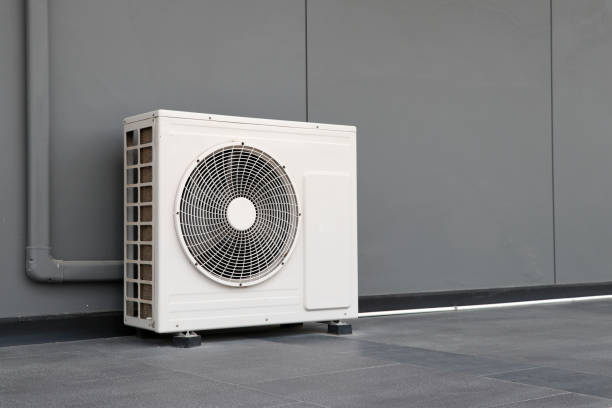 Condensing unit of air conditioning systems. Condensing unit installed on the gray wall. Condensing unit of air conditioning systems. Condensing unit installed on the gray wall. christian democratic union stock pictures, royalty-free photos & images
