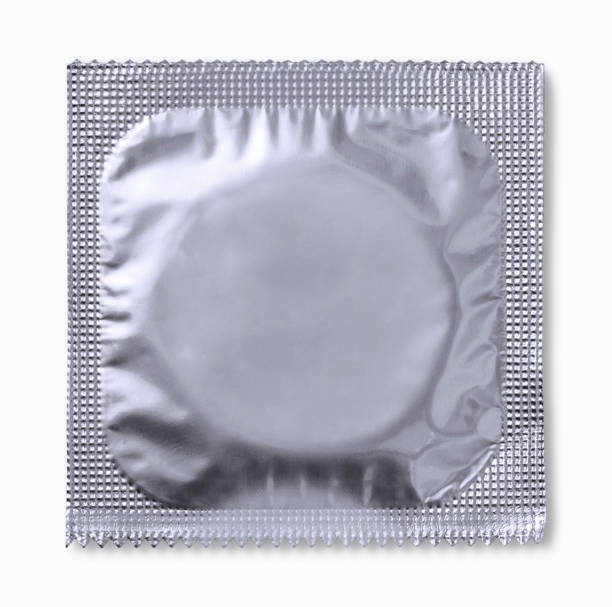Condom isolated on white background stock photo