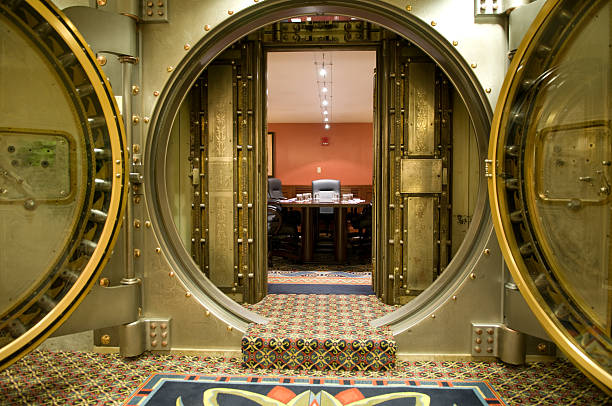 Conference Room Behind Large Metal Vault Doors What better way to keep your employees from sneaking out of meetings? safes and vaults stock pictures, royalty-free photos & images