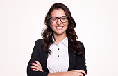 istock Confident business lady in eyeglasses smiling at camera 1348560795