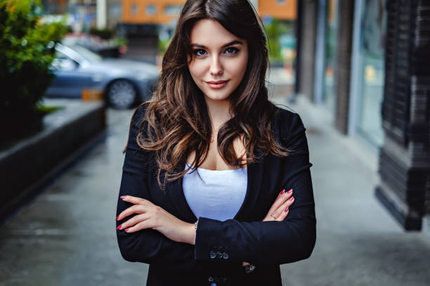 Confident business woman looking at the camera stock photo