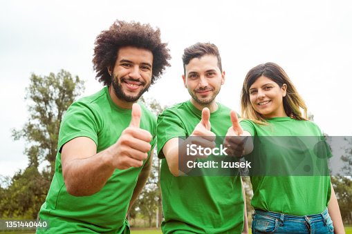 istock Confident environmentalists showing thumbs up 1351440440