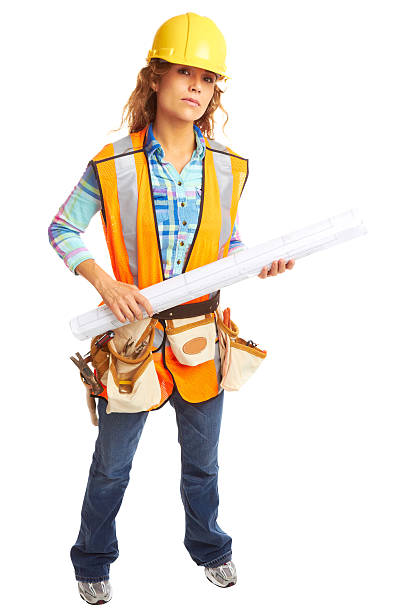 Confident Female Construction Worker Holding Blueprint stock photo