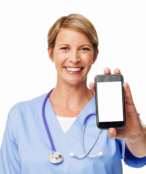 confident female nurse showing smart phone - happy scrubs nurse phone bildbanksfoton och bilder