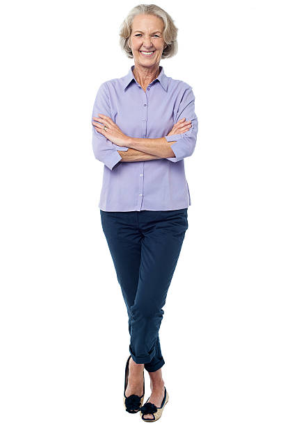 Confident looking aged woman in casuals stock photo